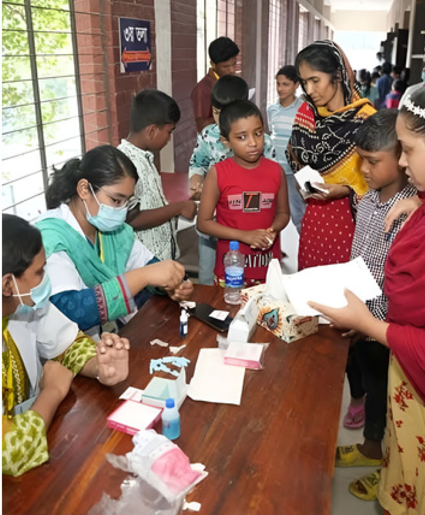 Health clinic check-up and medicine distribution for mothers and children